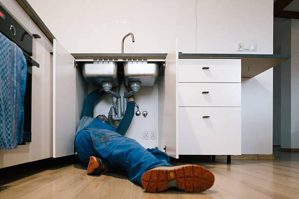 Professional Drain Cleaning technician working in Greensburg, IN